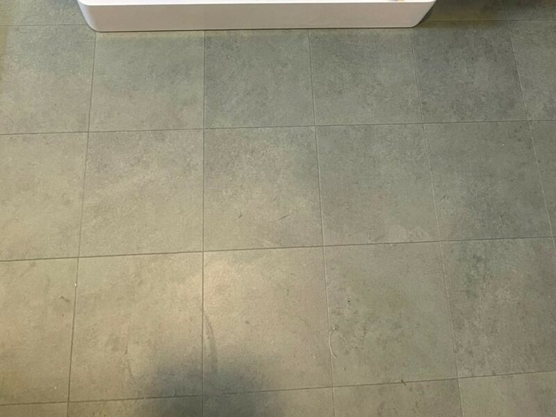 Amtico Signature Encaustic Okra 152mm x 152mm tile in a marbled green effect.